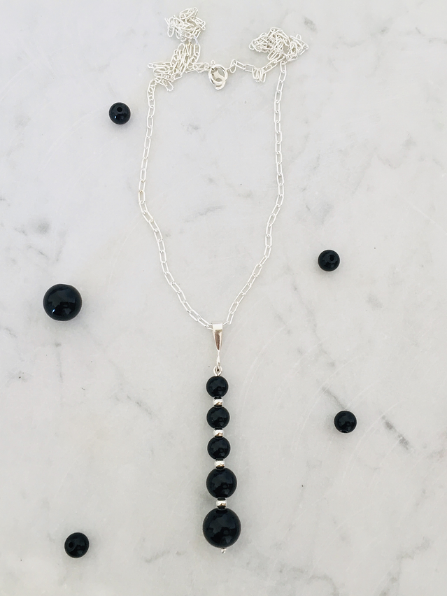 Conjunto de plata y piedras ónix 5