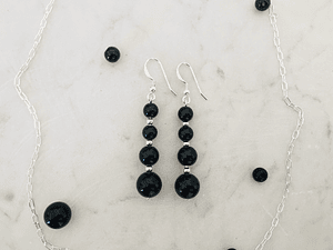 Aros de piedras ónix y detalles de plata