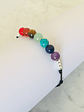 Pulsera de hilo negro regulable con piedras de los 7 chakras y detalles de plata - Miniatura 1
