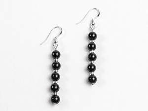 Aros de piedras onix y detalles de plata