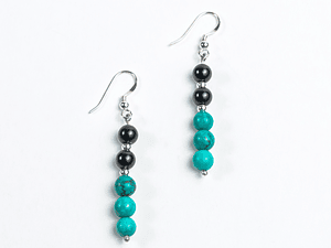 Aros de ónix, turquesa y detalles de plata