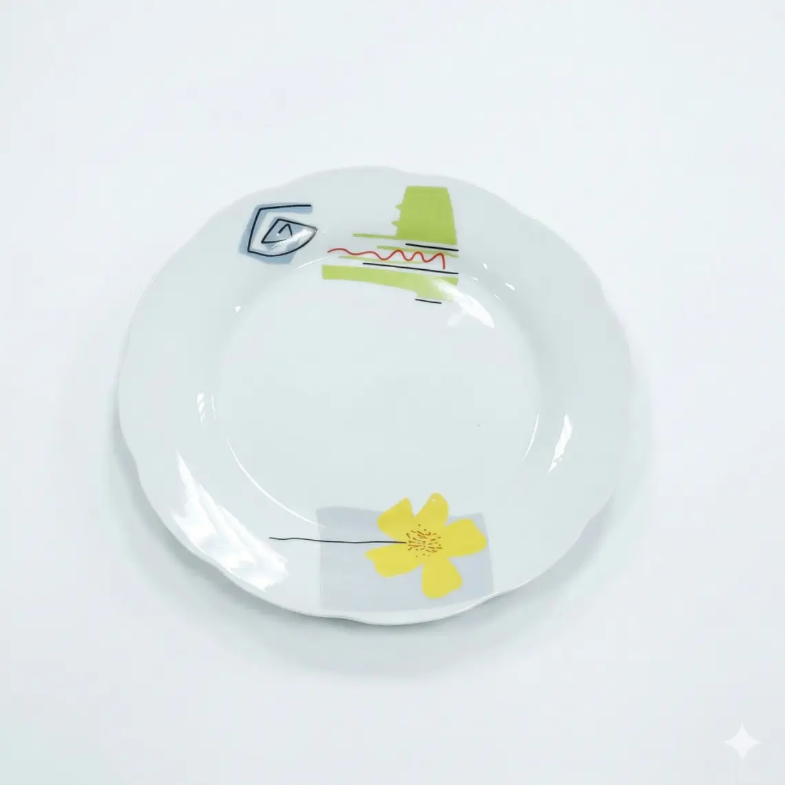 PLATO TENDIDO LOZA DECORADO 9