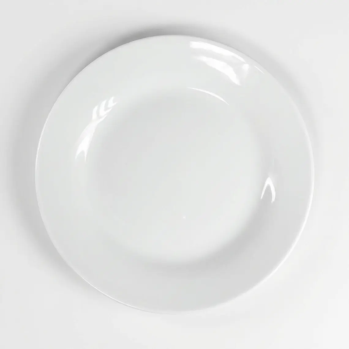 PLATO TENDIDO LOZA BLANCO 7