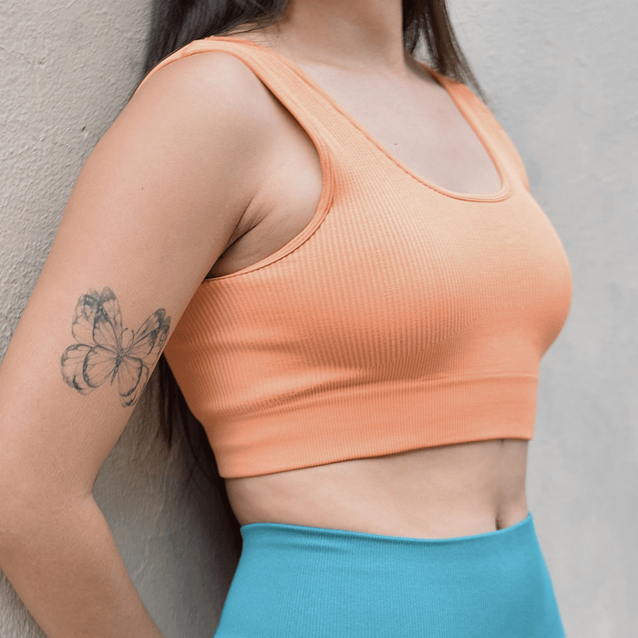 TOP DEPORTIVO SEAMLESS NARANJA