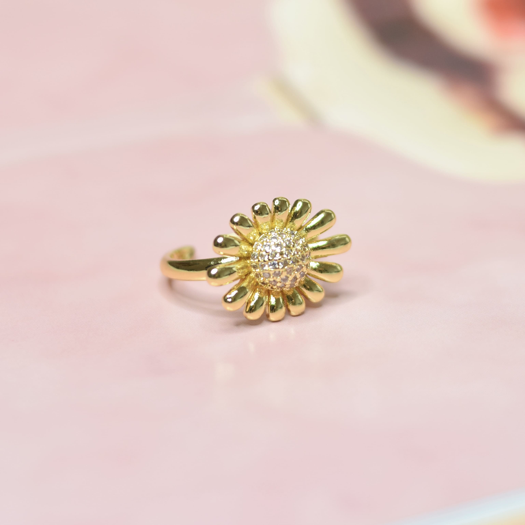 Anillo flor rodio graduable