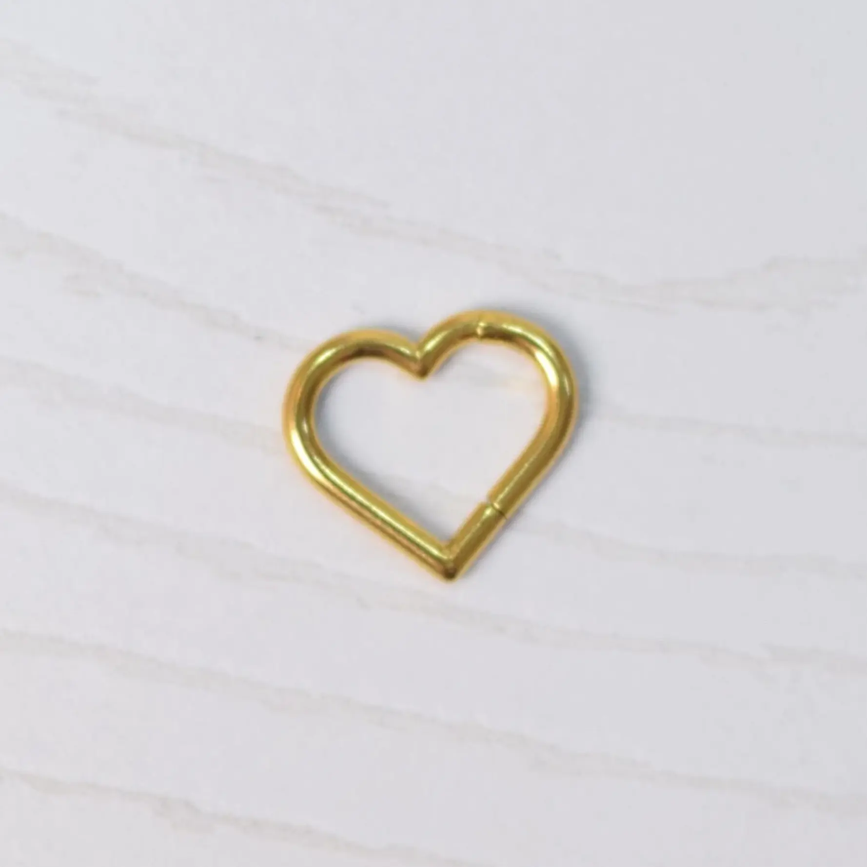 PIERCING CORAZON CLICKER 1