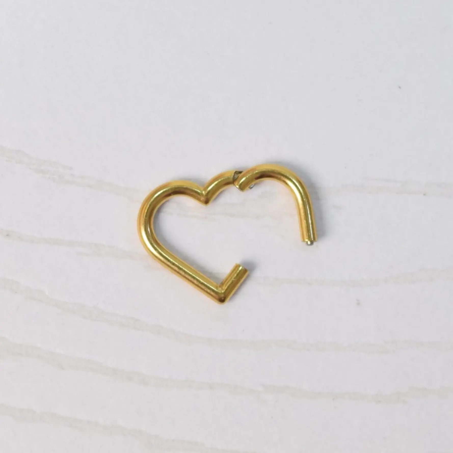 PIERCING CORAZON CLICKER 2