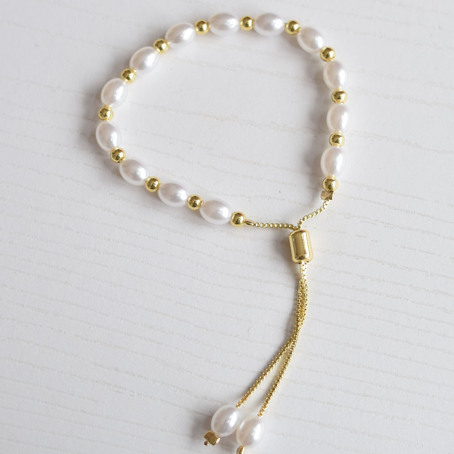 Pulsera perlas y balines