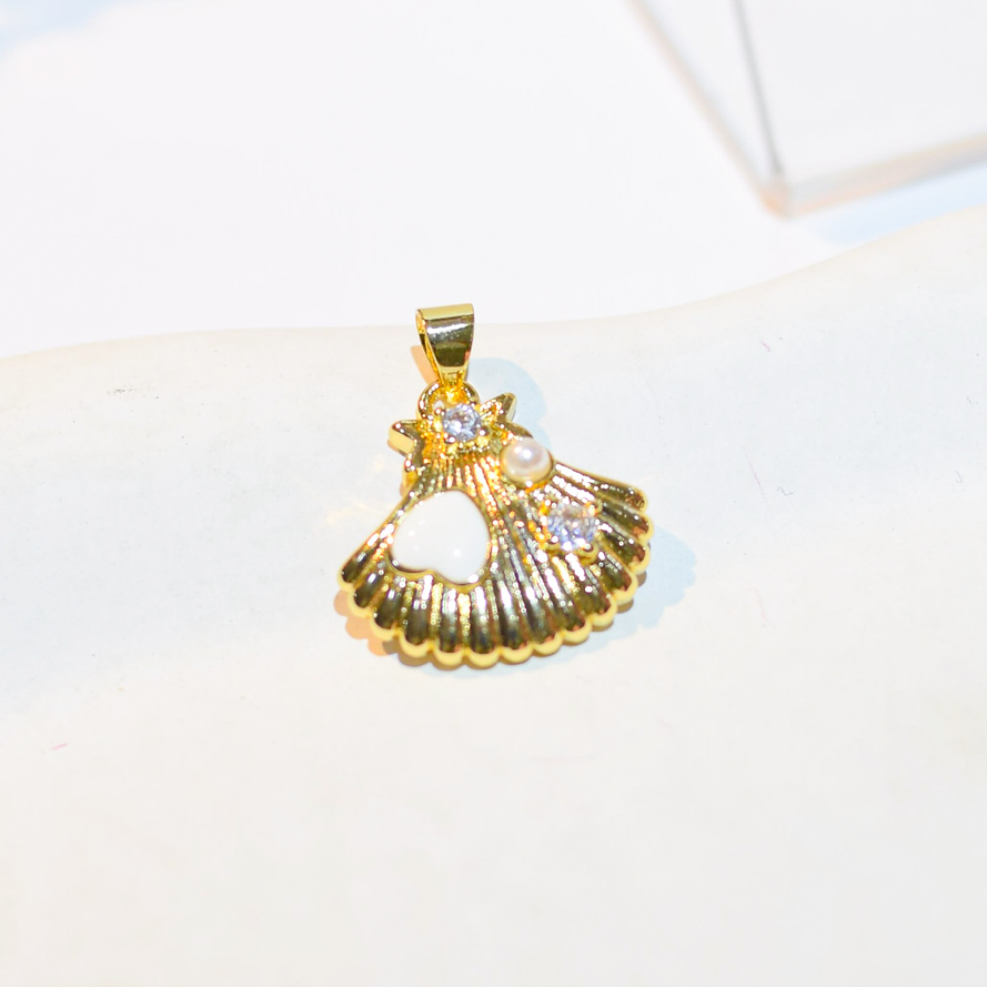 DIJE CONCHA DORADA CIRCONES