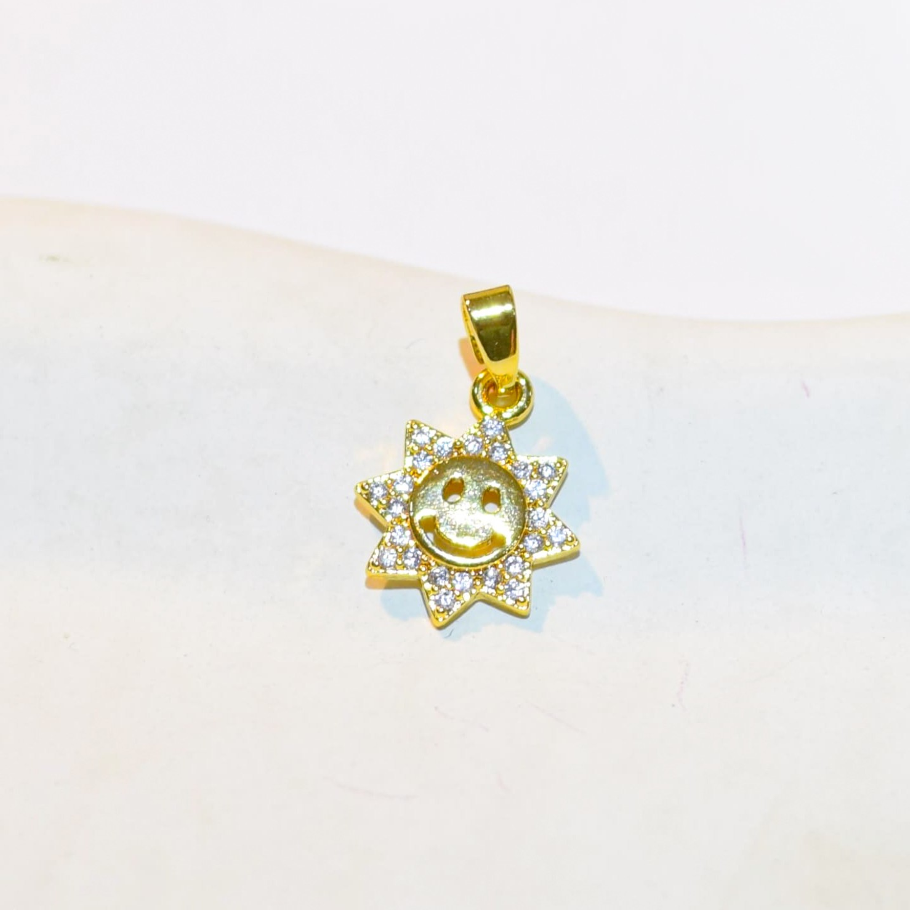 DIJE SOL CARITA FELIZ