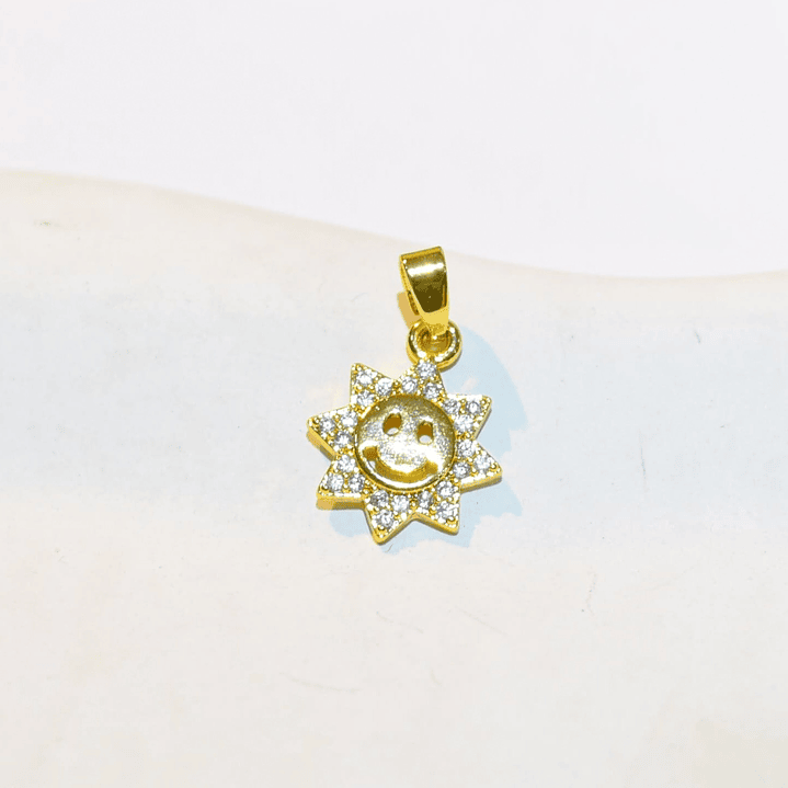 DIJE SOL CARITA FELIZ