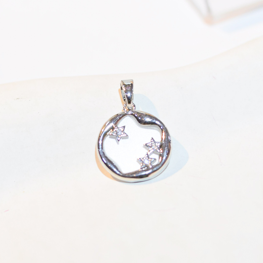 DIJE MEDALLA NACAR ESTRELLAS PLATEADA