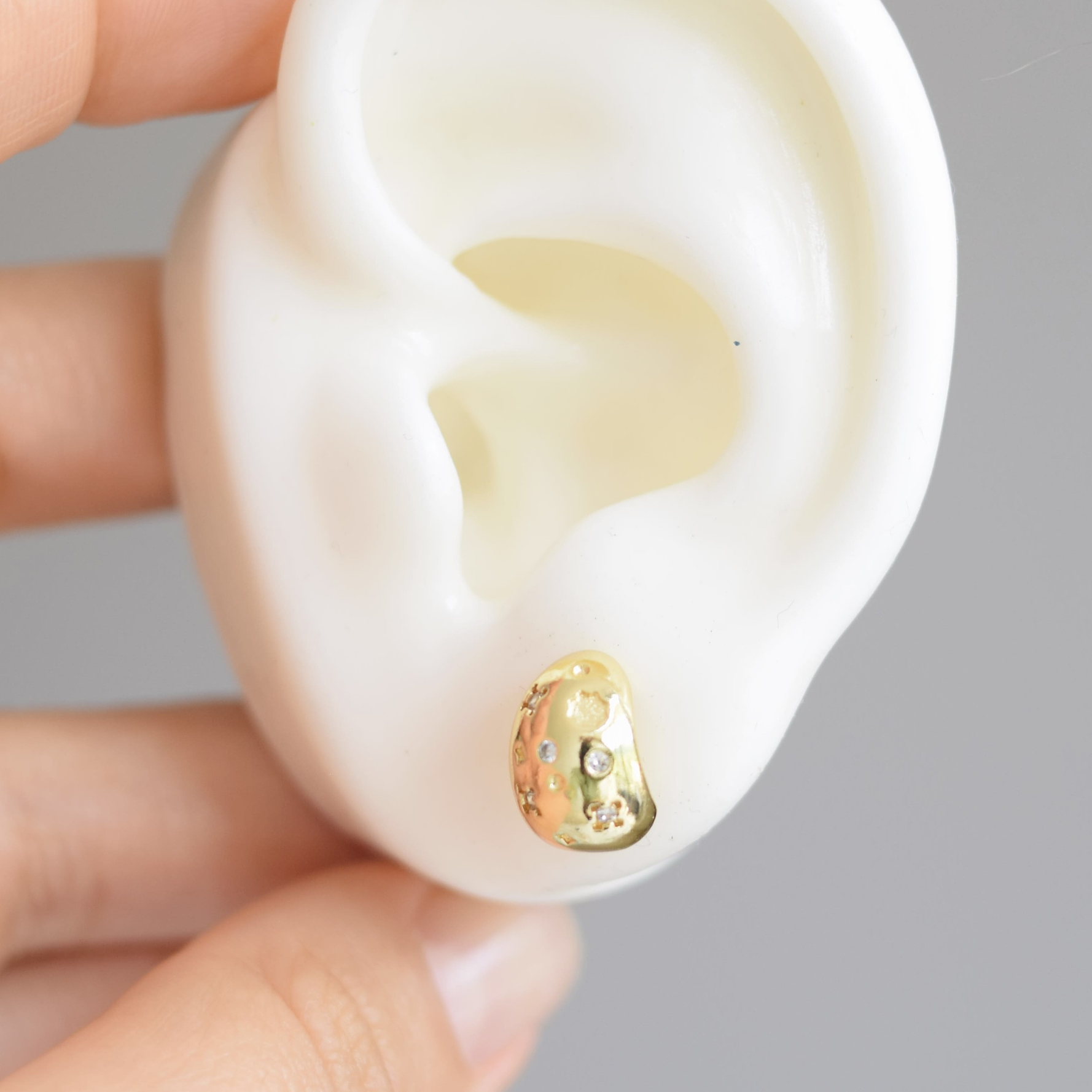 TOPO GOTA CIRCONES  2