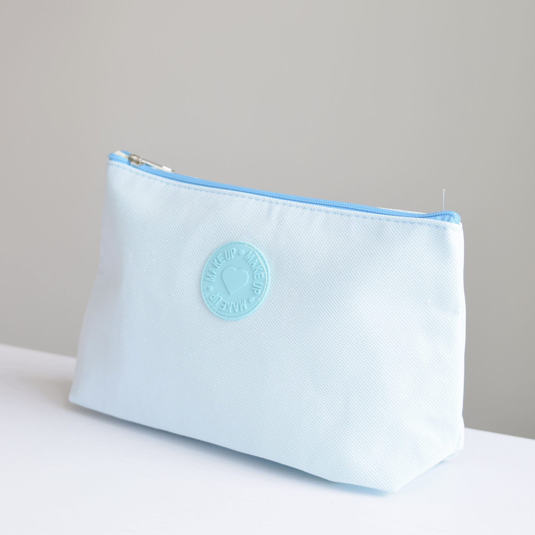 COSMETIQUERA AZUL ESCARCHADA