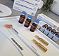 caja 5 viales 5 ml despigmentante solución 210 mesoestetic  - Miniatura 9