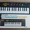 TECLADO PIANO ORGANO MUSICAL INFANTIL A PILA 2