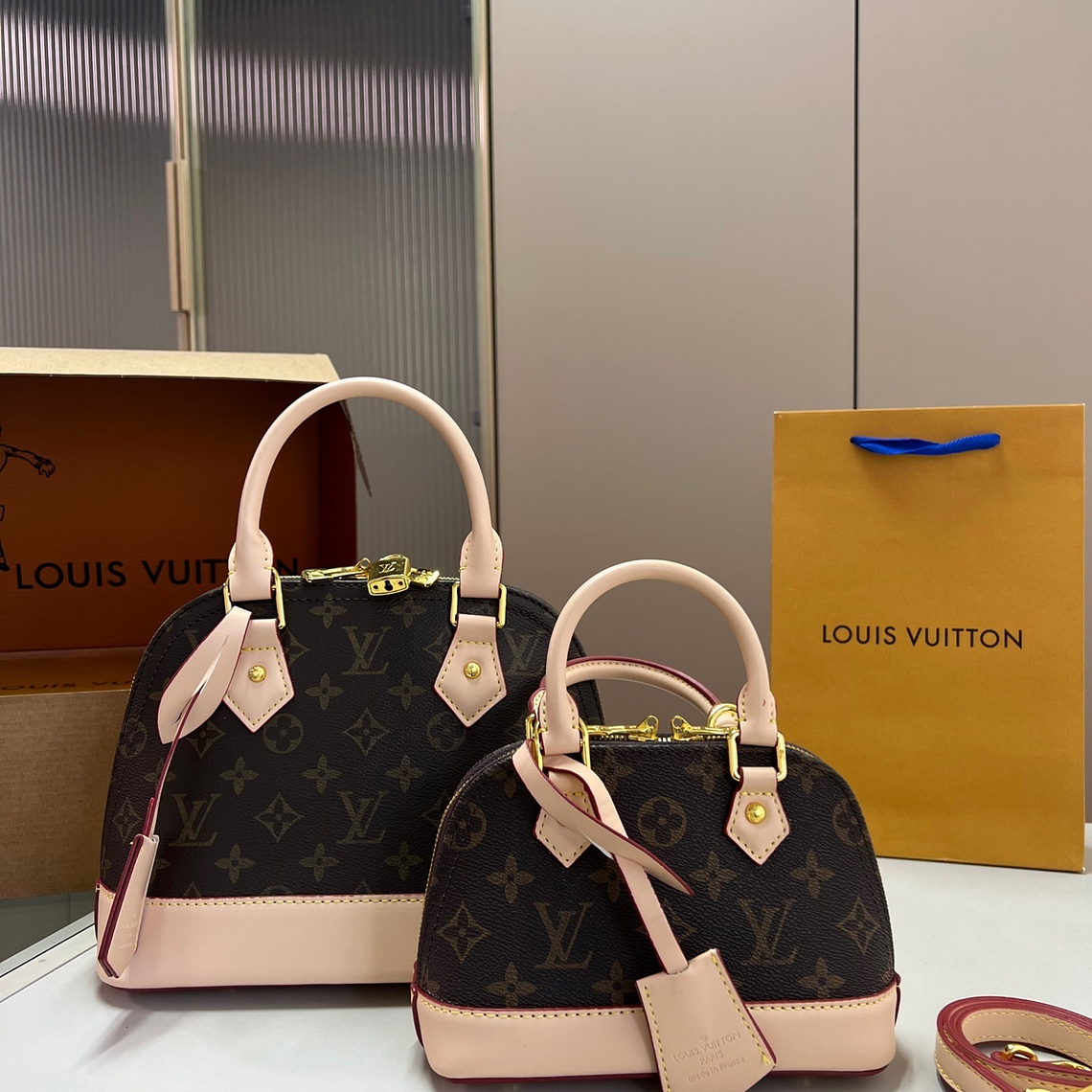 LV bell bag 1