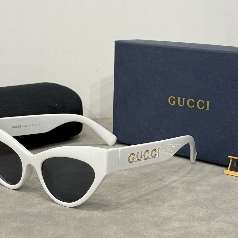 Óculos de Sol Gucci 7025 4