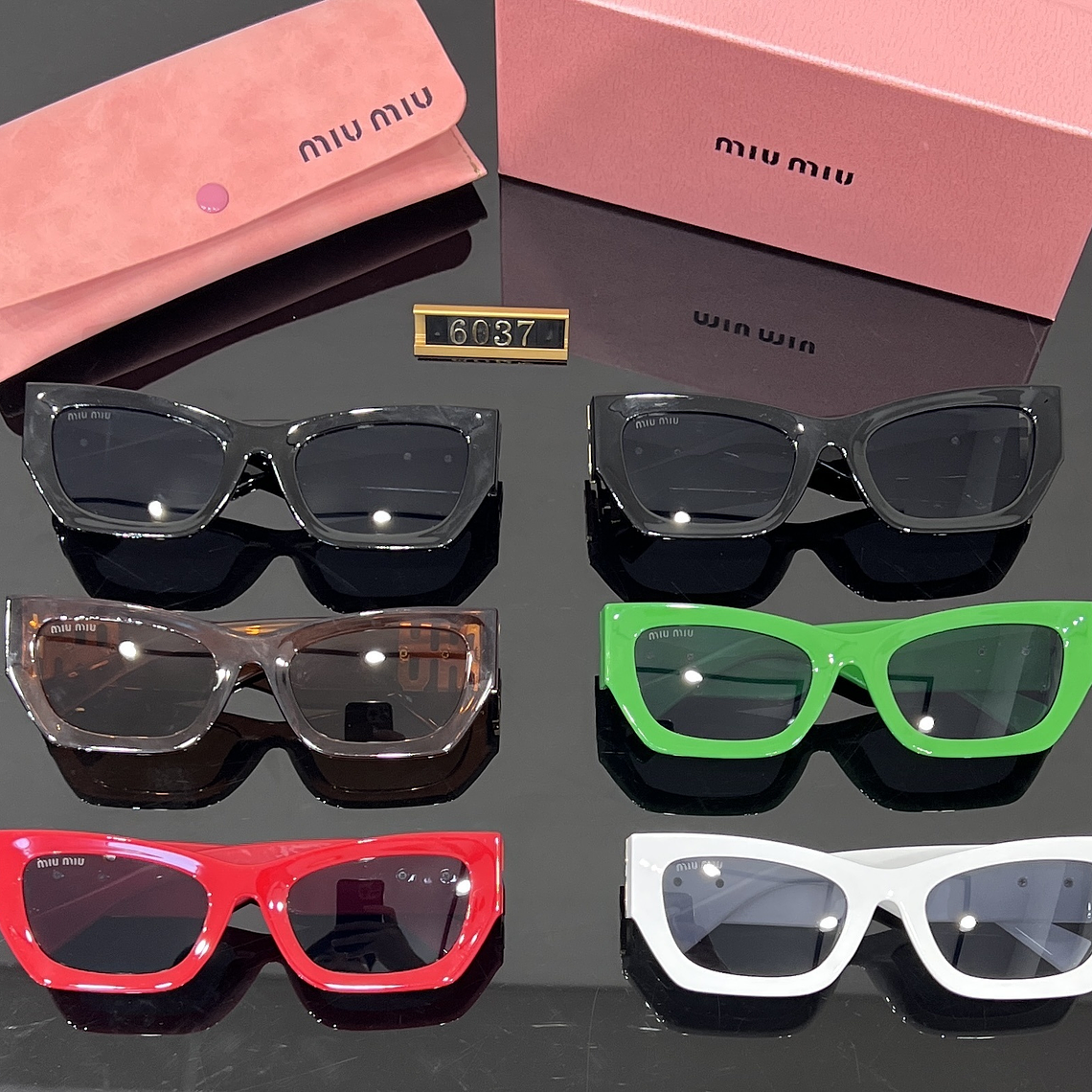 Óculos de Sol Miu Miu 6037 8