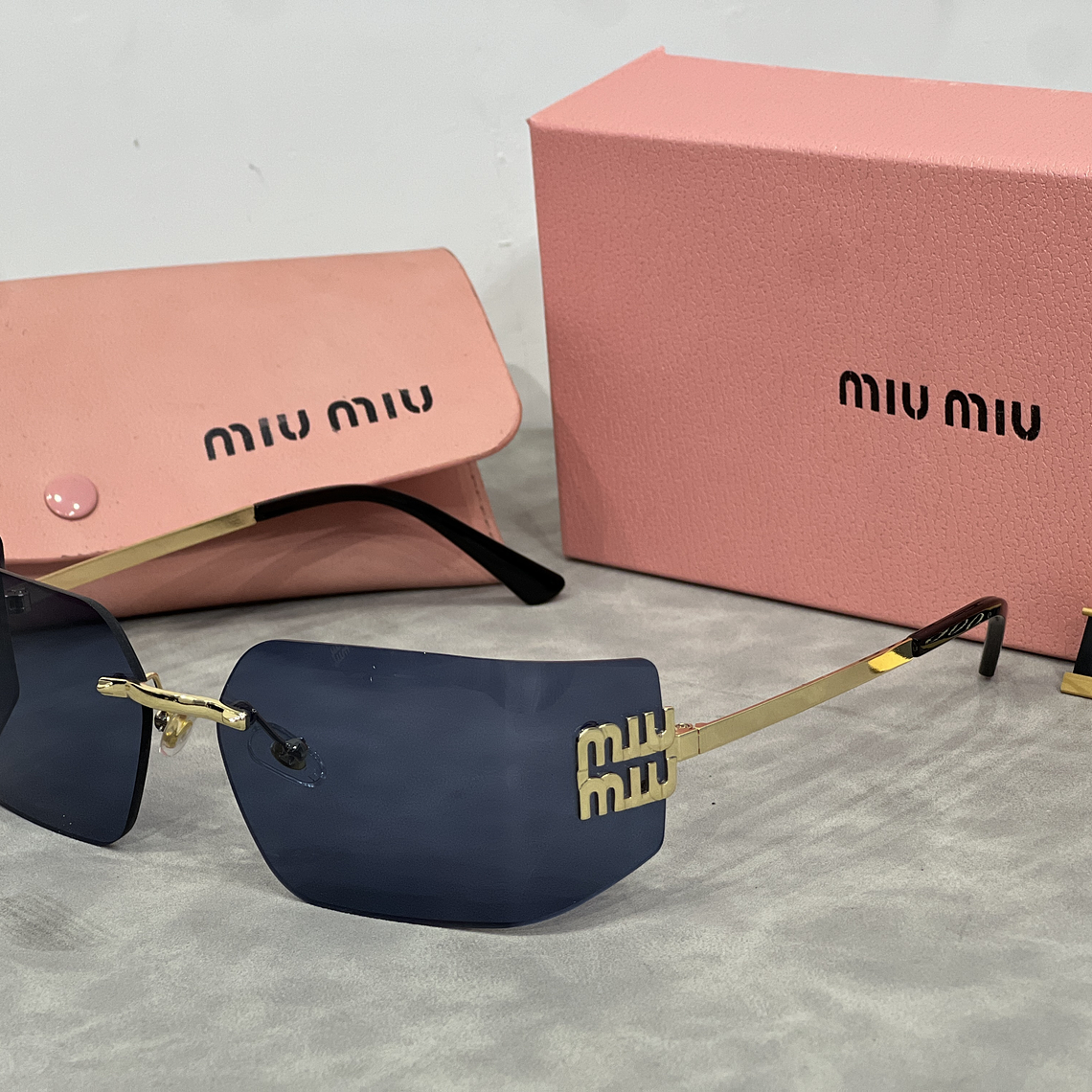 Óculos de Sol Miu Miu 8006 4