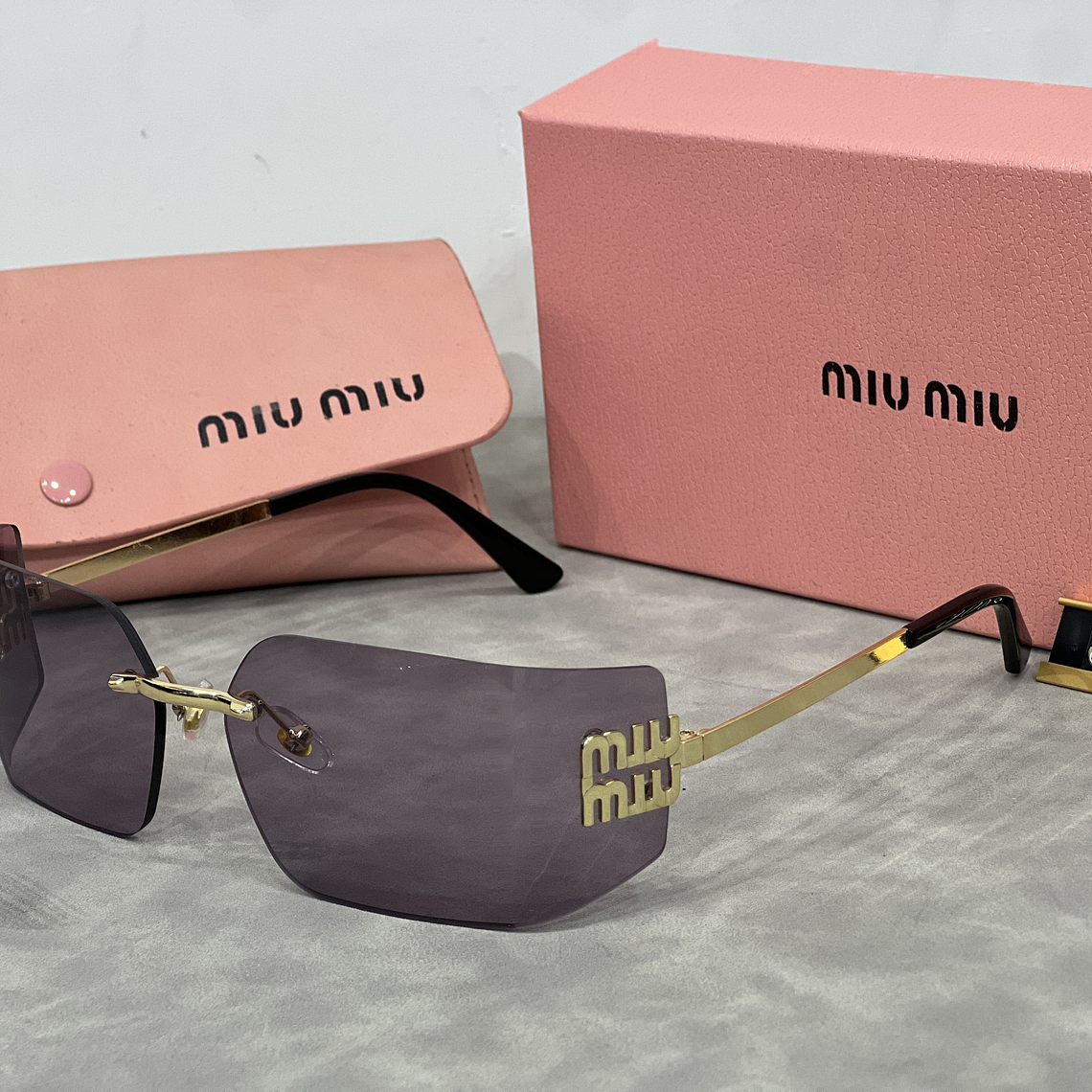 Óculos de Sol Miu Miu 8006 6