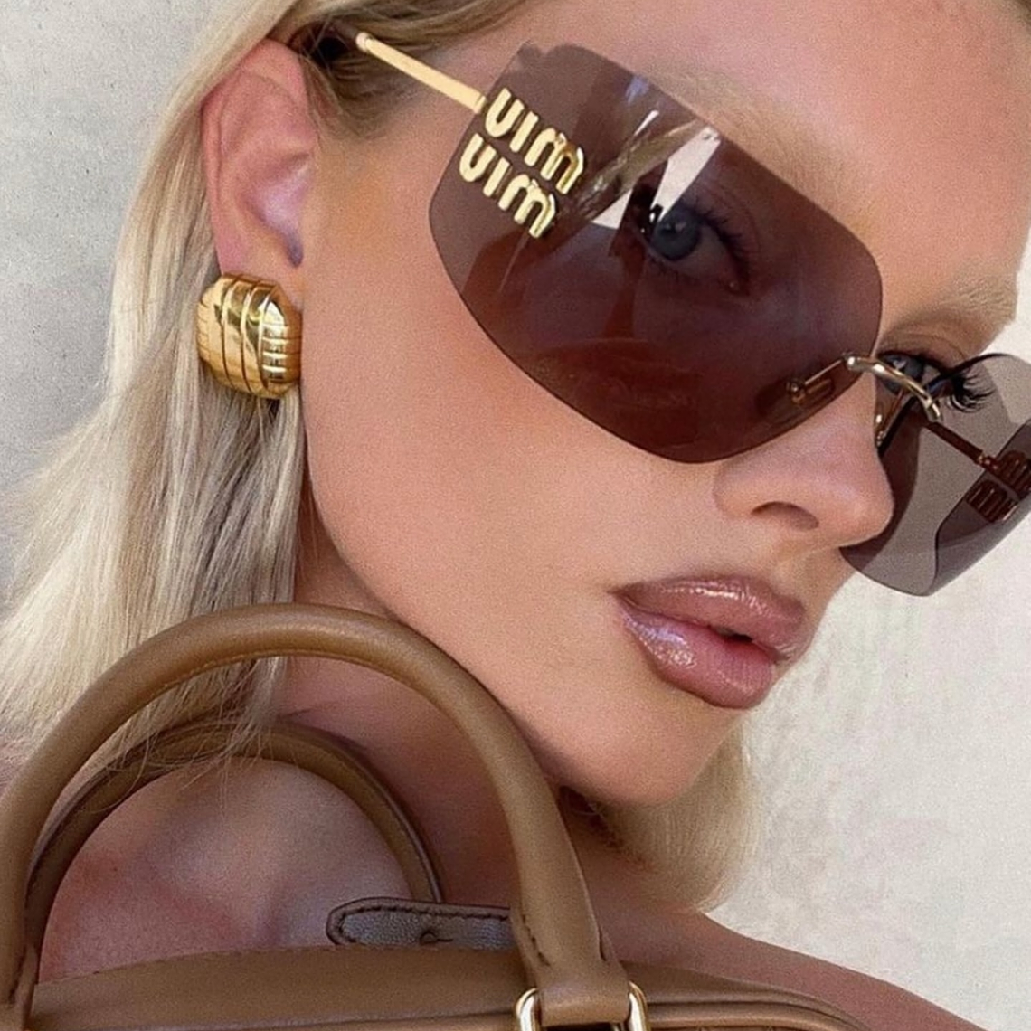 Óculos de Sol Miu Miu 8006 9