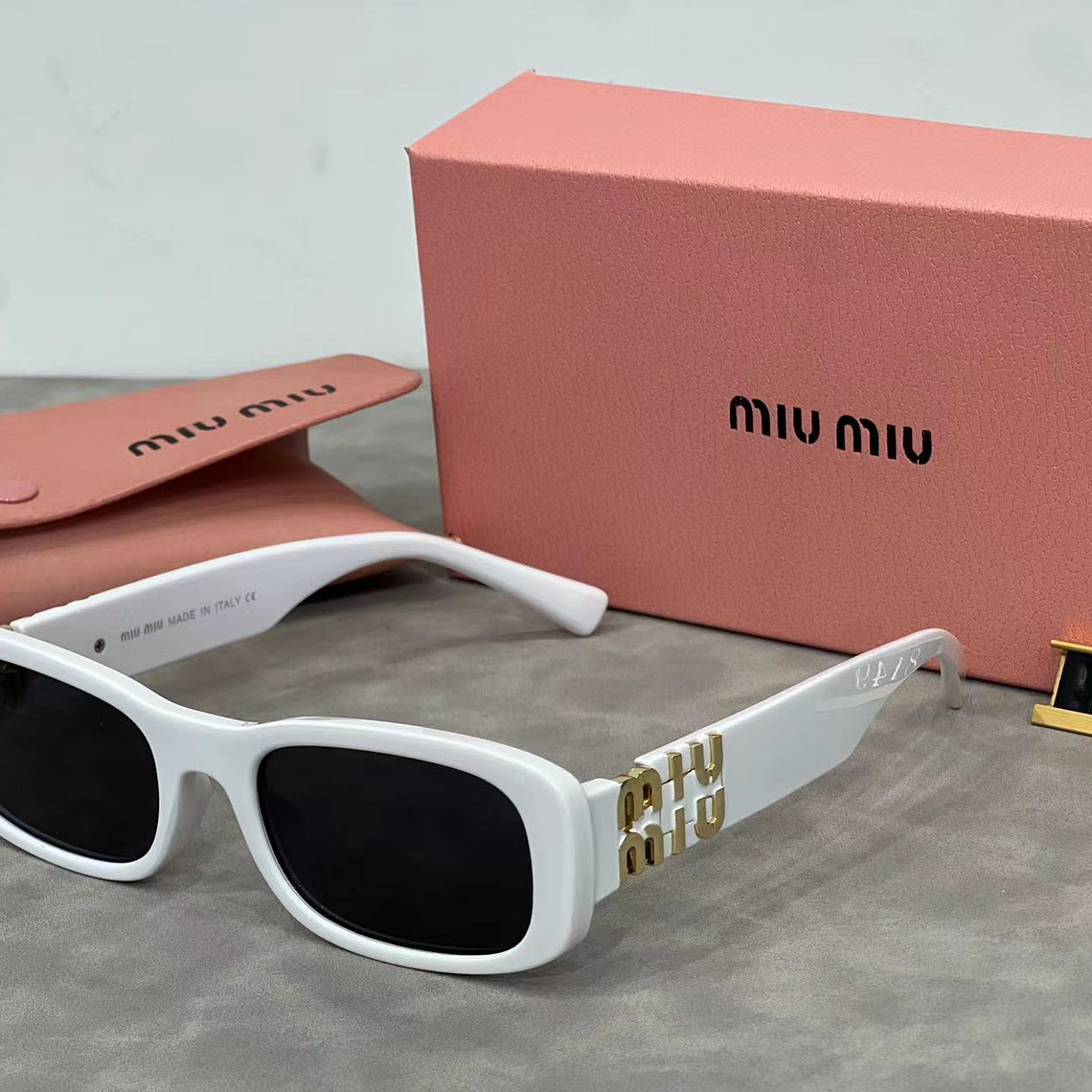 Óculos de Sol Miu Miu 8149 2