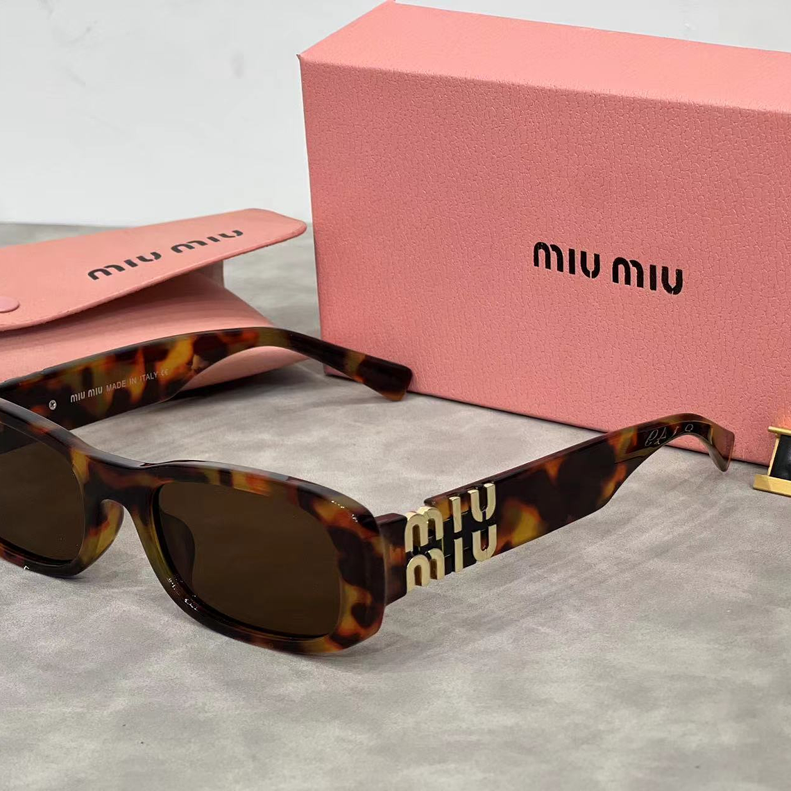 Óculos de Sol Miu Miu 8149 4