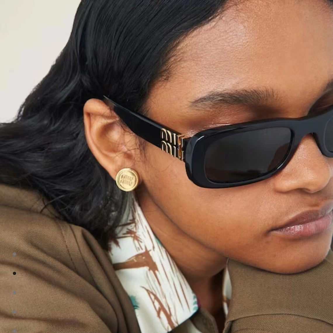 Óculos de Sol Miu Miu 8149 9