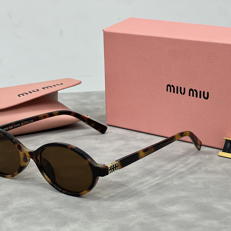 Óculos de Sol Miu Miu 5519 4
