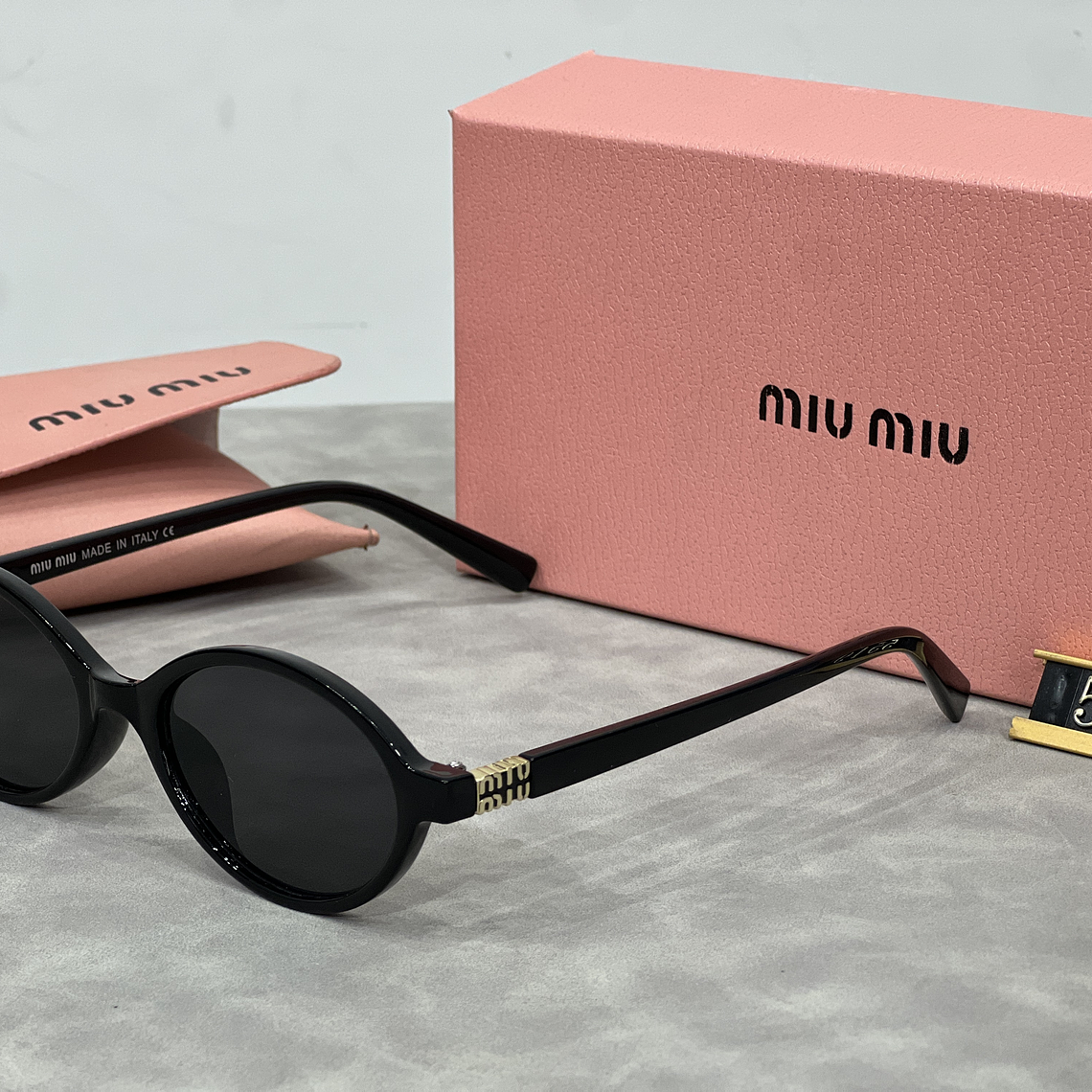 Óculos de Sol Miu Miu 5519 6