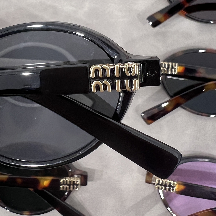 Óculos de Sol Miu Miu 5519 12