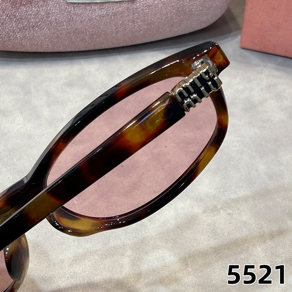 Óculos de Sol Miu Miu 5521 12
