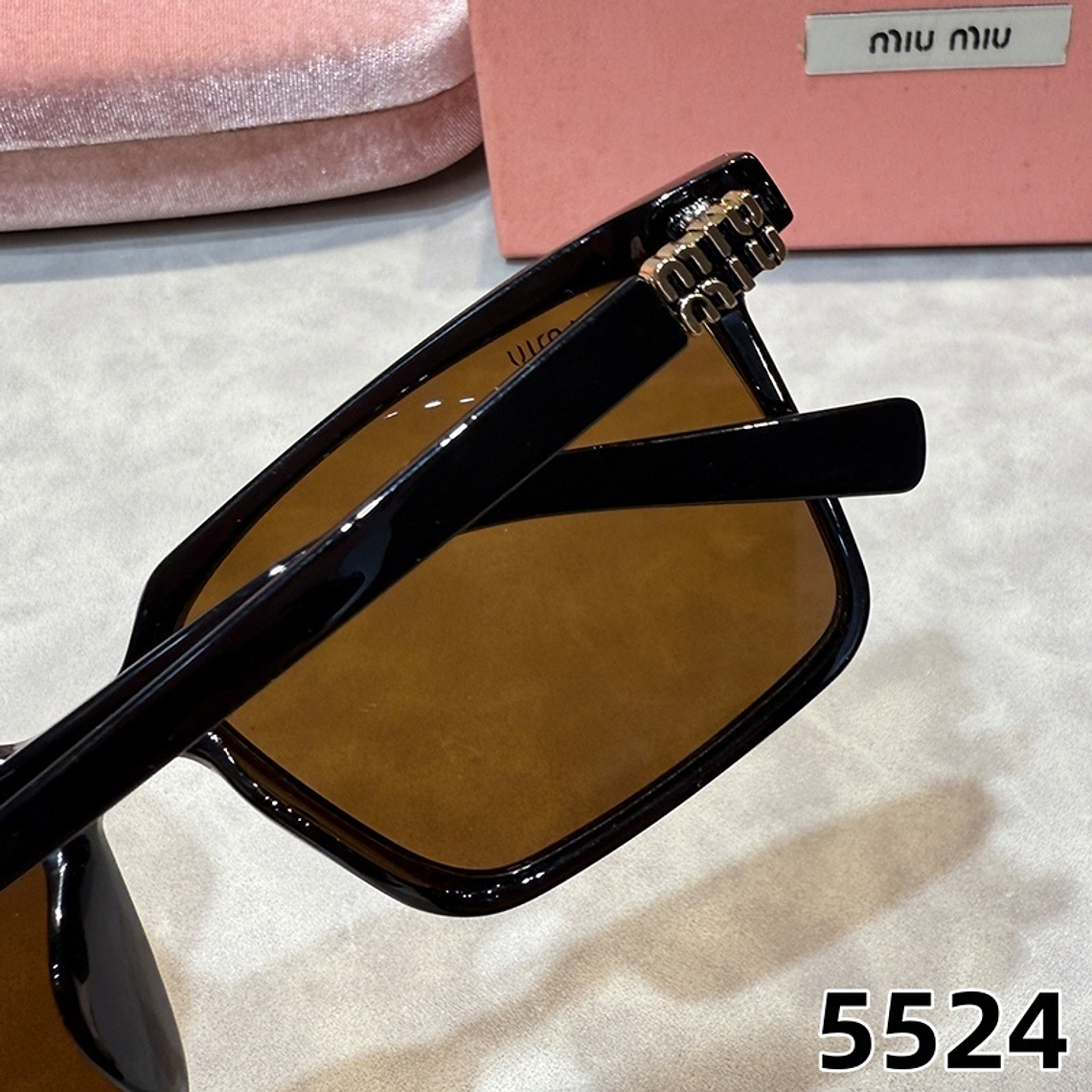 Óculos de Sol Miu Miu 5524 11
