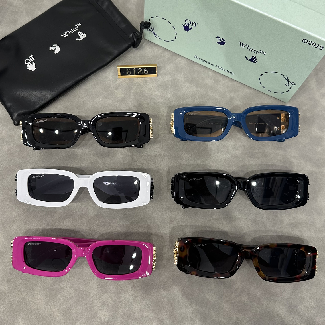 Óculos de Sol Off White 6186 10