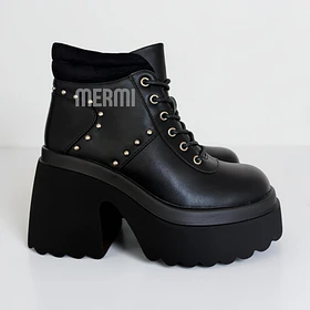 BOTAS ECO CUERO NEGRO 2526