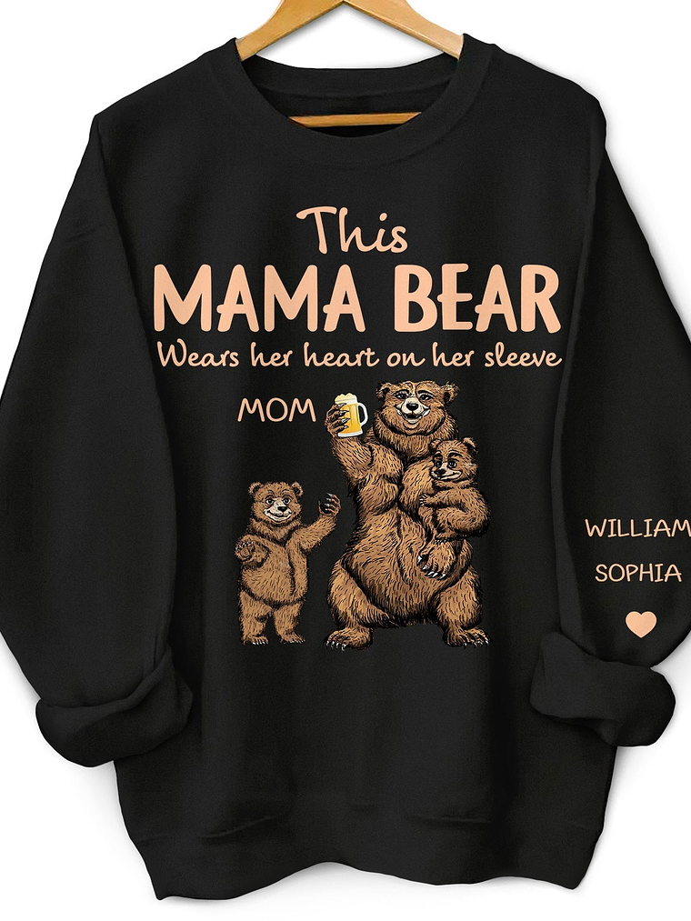 This Mama Bear Wears Her Heart - Gift For Mom, Nana - Personalized Unisex Sweatshirt With Design On Sleeve 1
