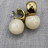 Aros Esfera Resina y Acero Baño Oro