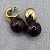 Aros Esfera Resina y Acero Baño Oro
