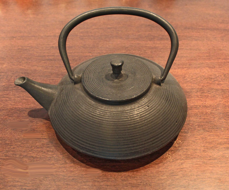 Tetera fierro Ovalada