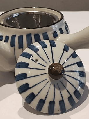 Tetera mango lateral