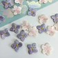 10 unids/lote de parches bordados de flor de cerezo 3D, apliques cosidos a mano DIY de color morado y rosa para ropa de moda, sombreros, bolsos, decoración - Miniatura 1