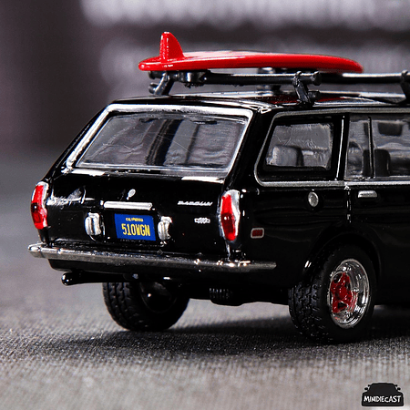 Tarmac Works 1:64 Mijo Exclusive Datsun Bluebird 510 Wagon Black With Surfboard Special Limited Edition.