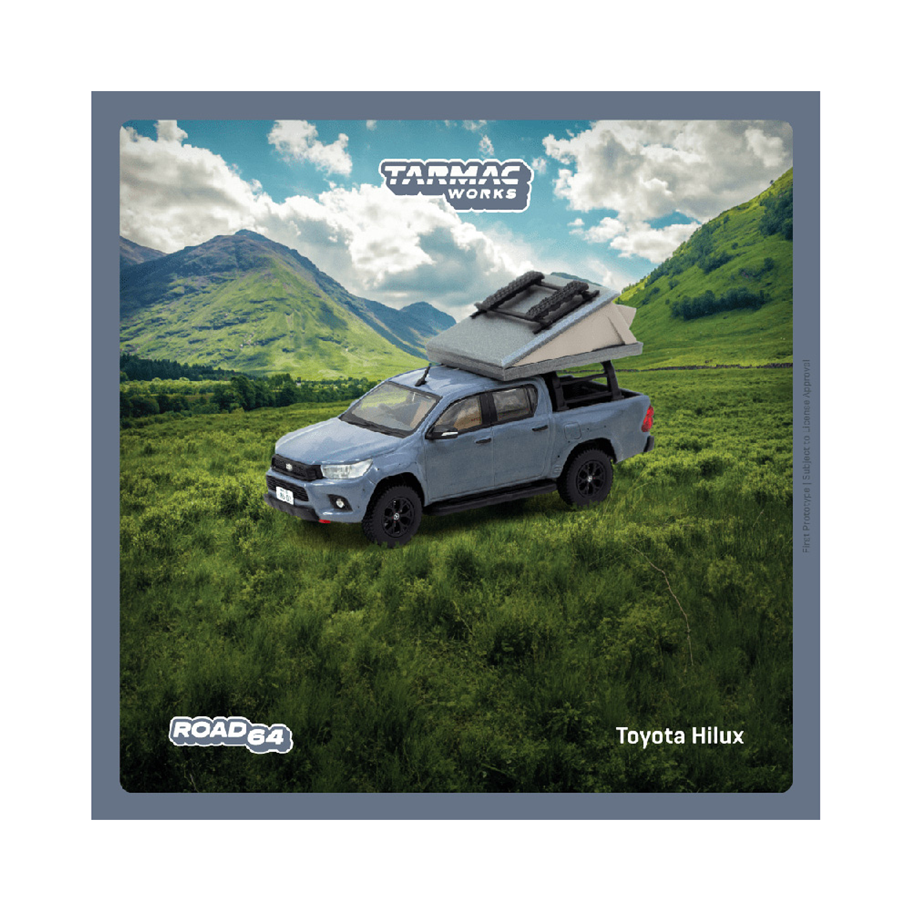 (PREVENTA) Tarmac Works 1:64 Toyota Hilux – Grey – Road64