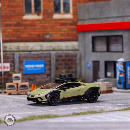 Sparky 1:64 Lamborghini Huracán Sterrato with a roof rack and a wheel - Green.