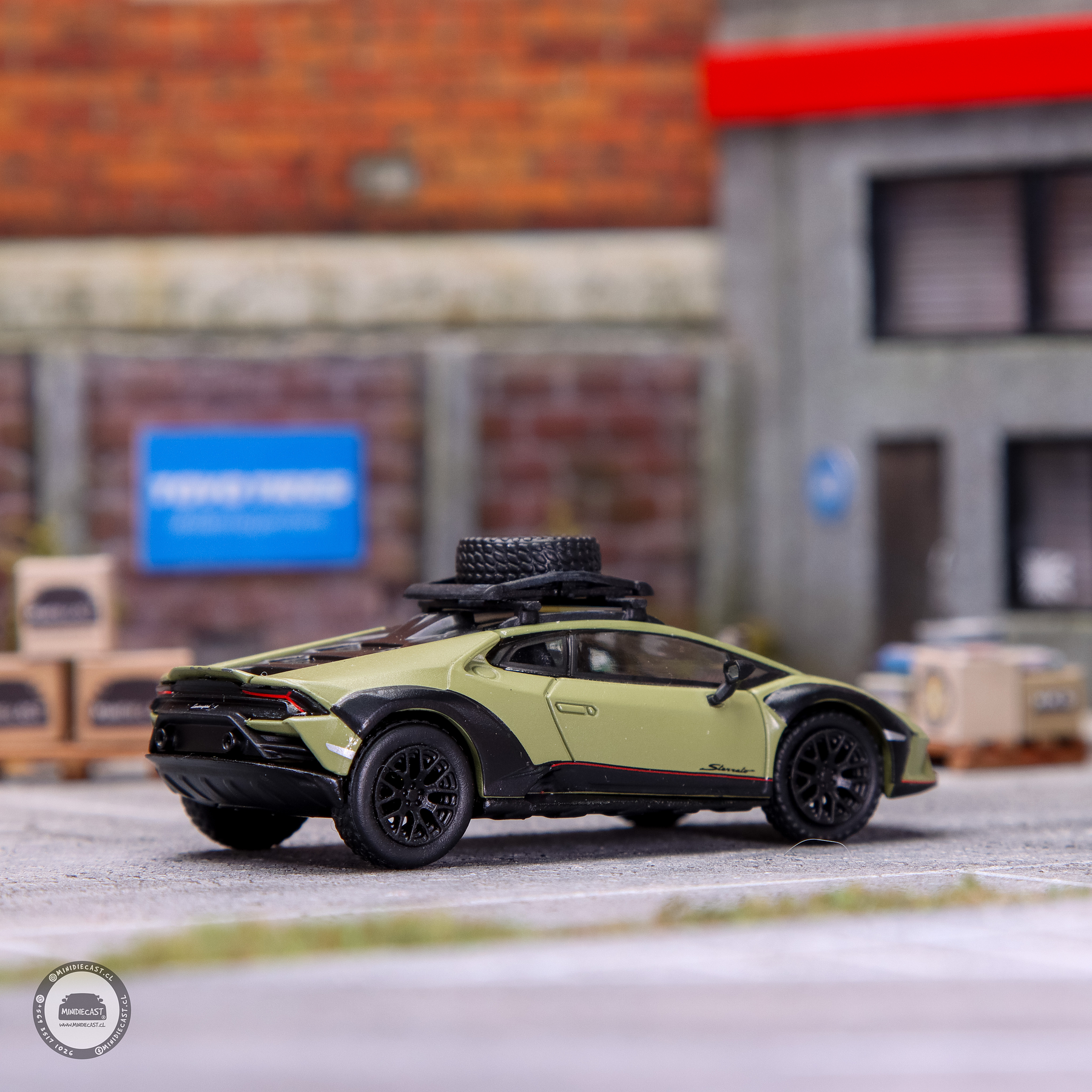 Sparky 1:64 Lamborghini Huracán Sterrato with a roof rack and a wheel - Green.