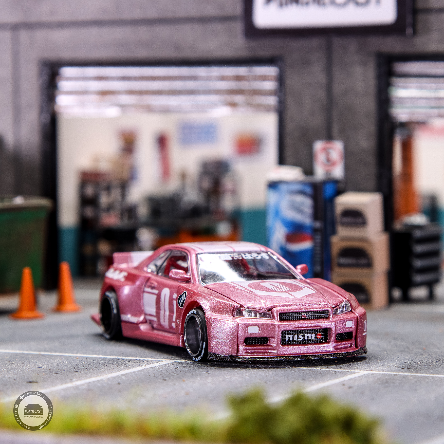 Kaido House x Mini GT 1:64 Nissan Skyline GT-R (R34) Kaido Racing Factory V1 – Pink.