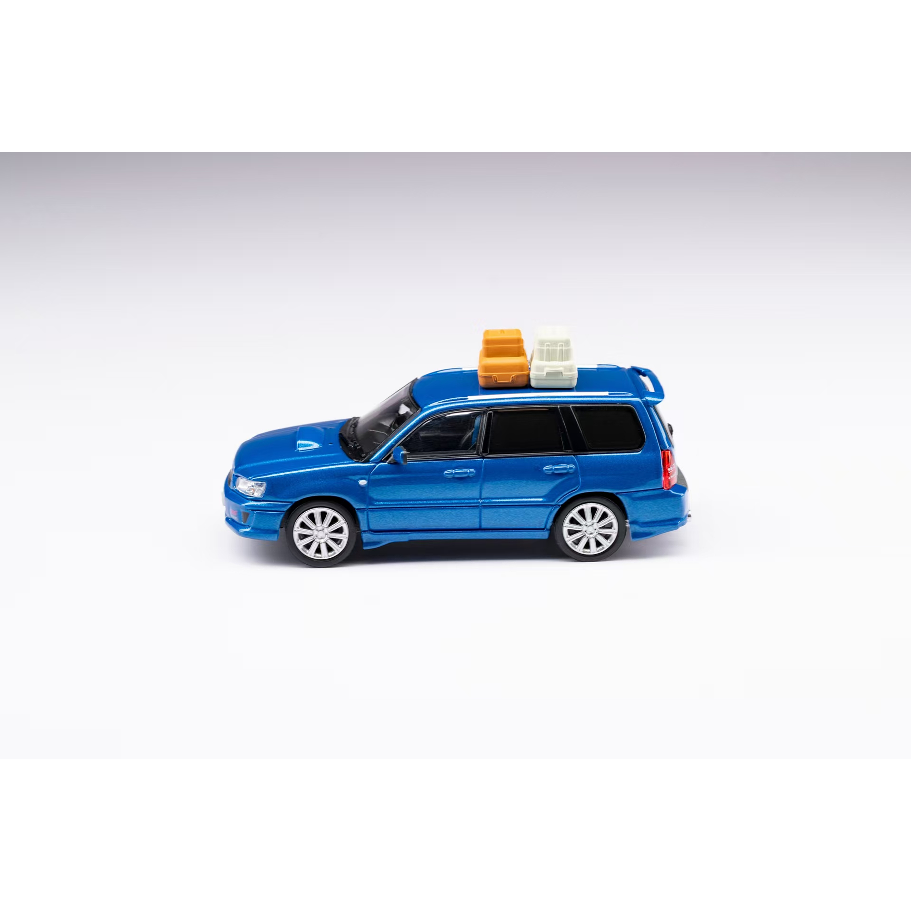 Model Model 1:64 Subaru Forester SG9 Sti blue.