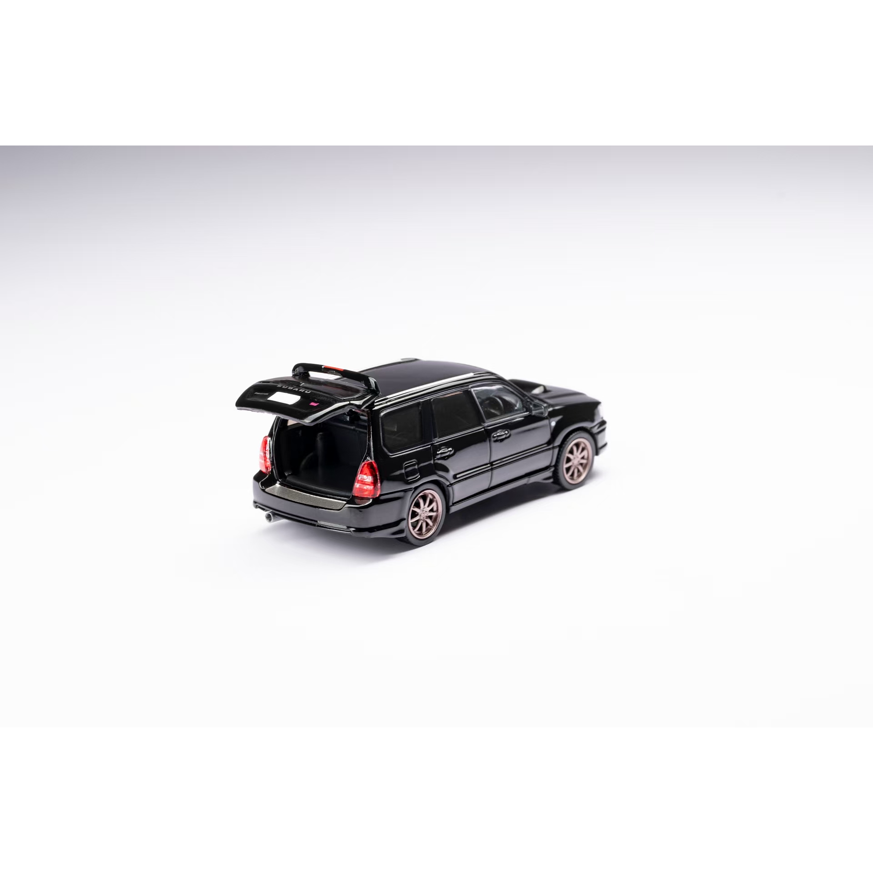 Model Model 1:64 Subaru Forester SG9 Sti black.