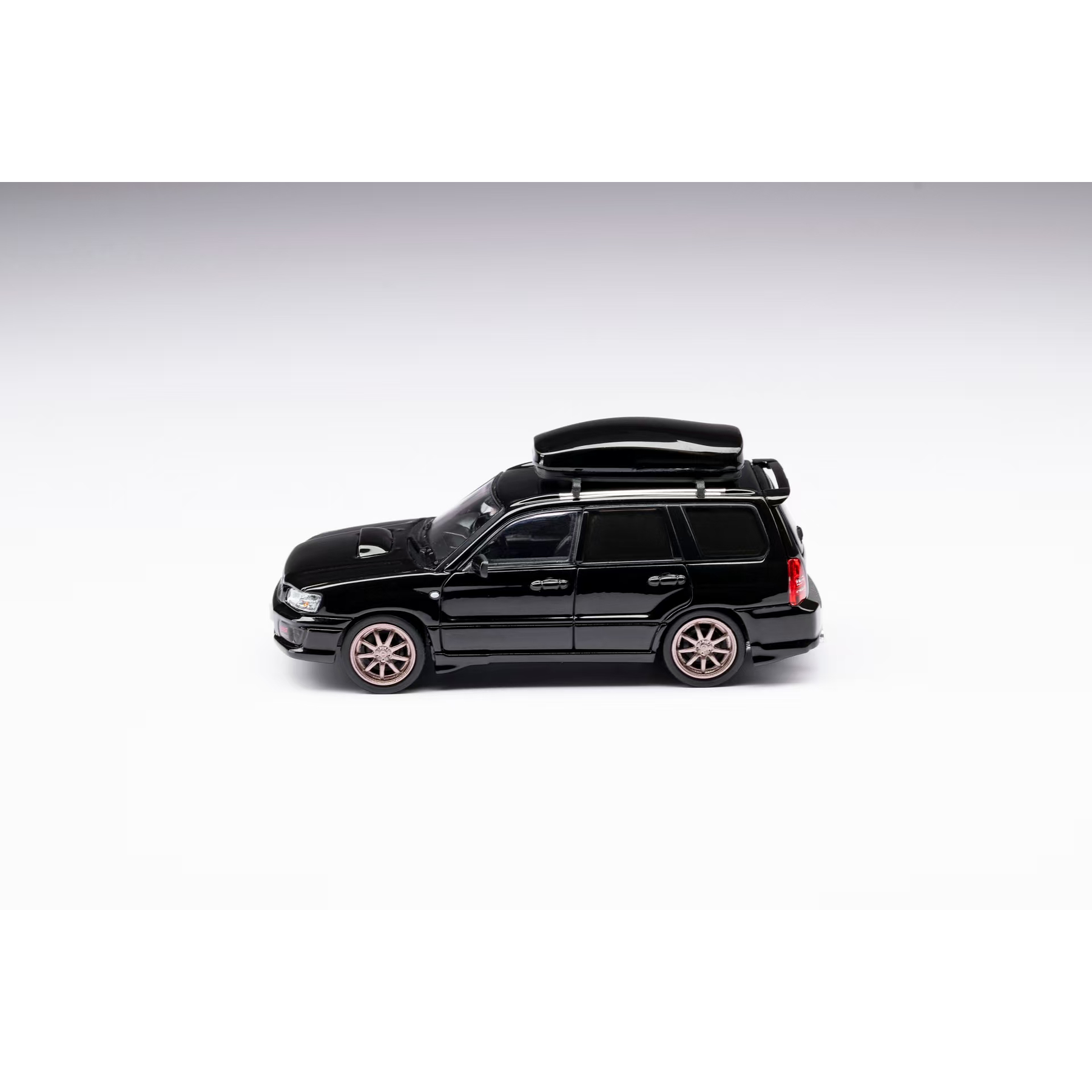 Model Model 1:64 Subaru Forester SG9 Sti black.